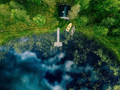 aerial-view-of-sauna-house-by-the-lake-shore-wood-resize.jpg